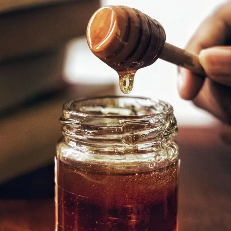 flüssiger Honig im Glas